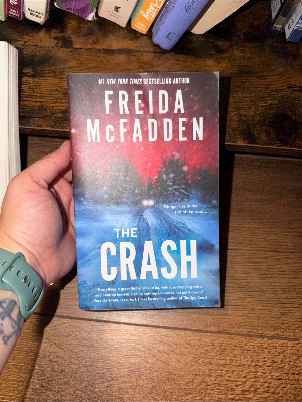 Freida McFadden "The Crash" Paperback - Blue & Red Cover